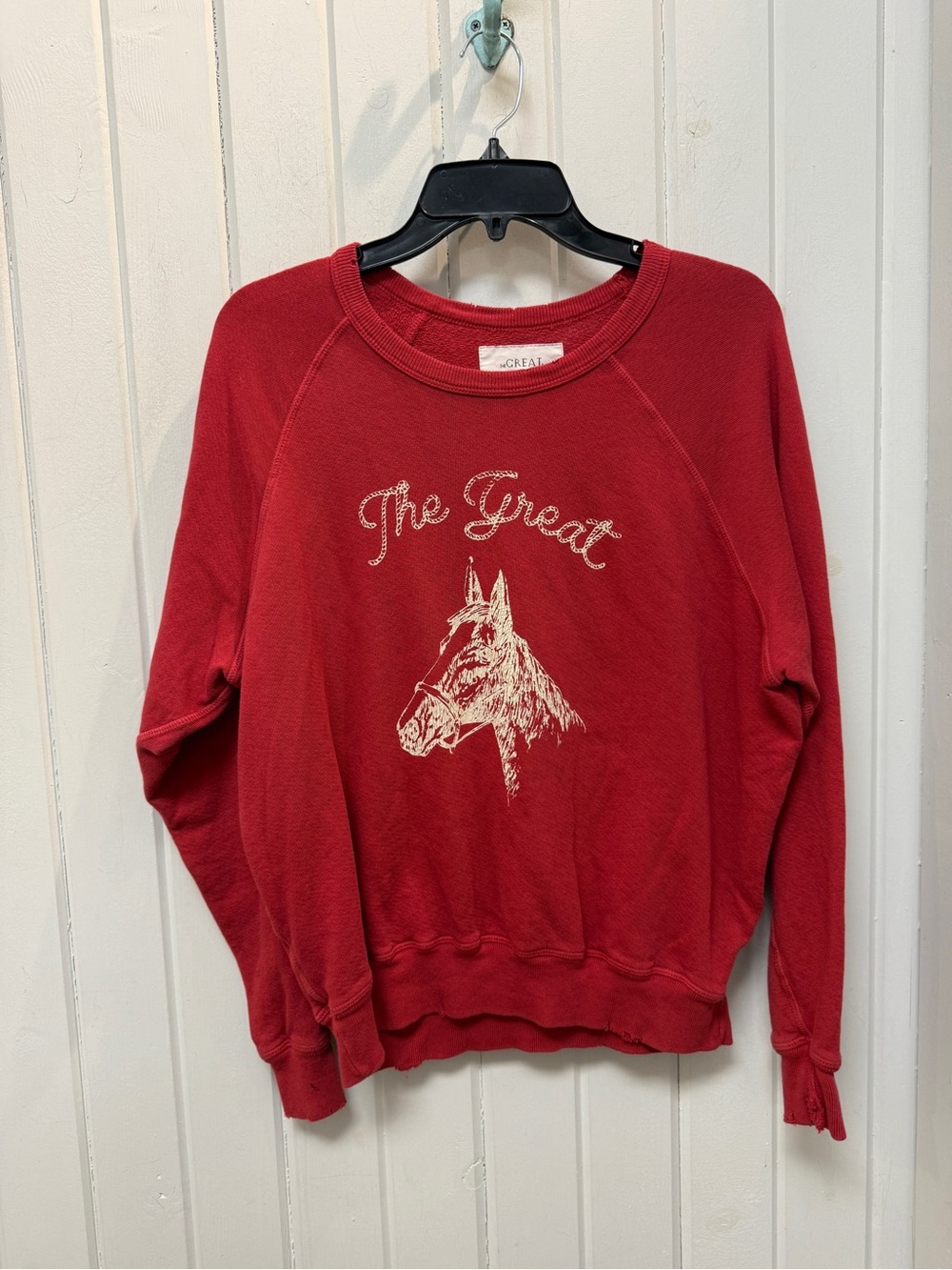 THE GREAT. The College Red Crewneck Sweatshirt with Horse Graphic